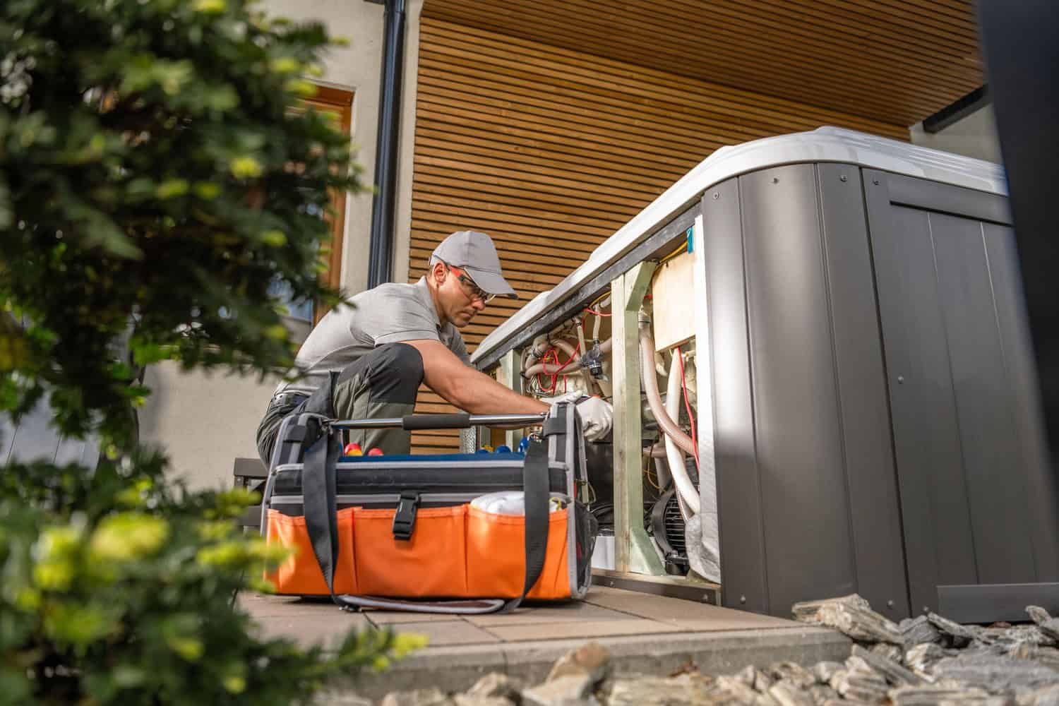 Suncoast Power Solutions Man Working on Generator
